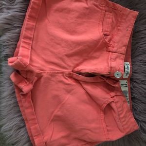 High-waisted coral shorts